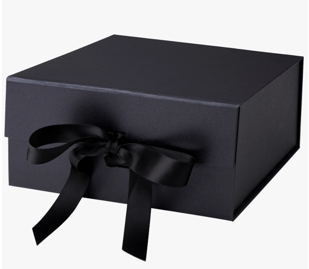 close up of black gift box included in our tea an cookies gift basket