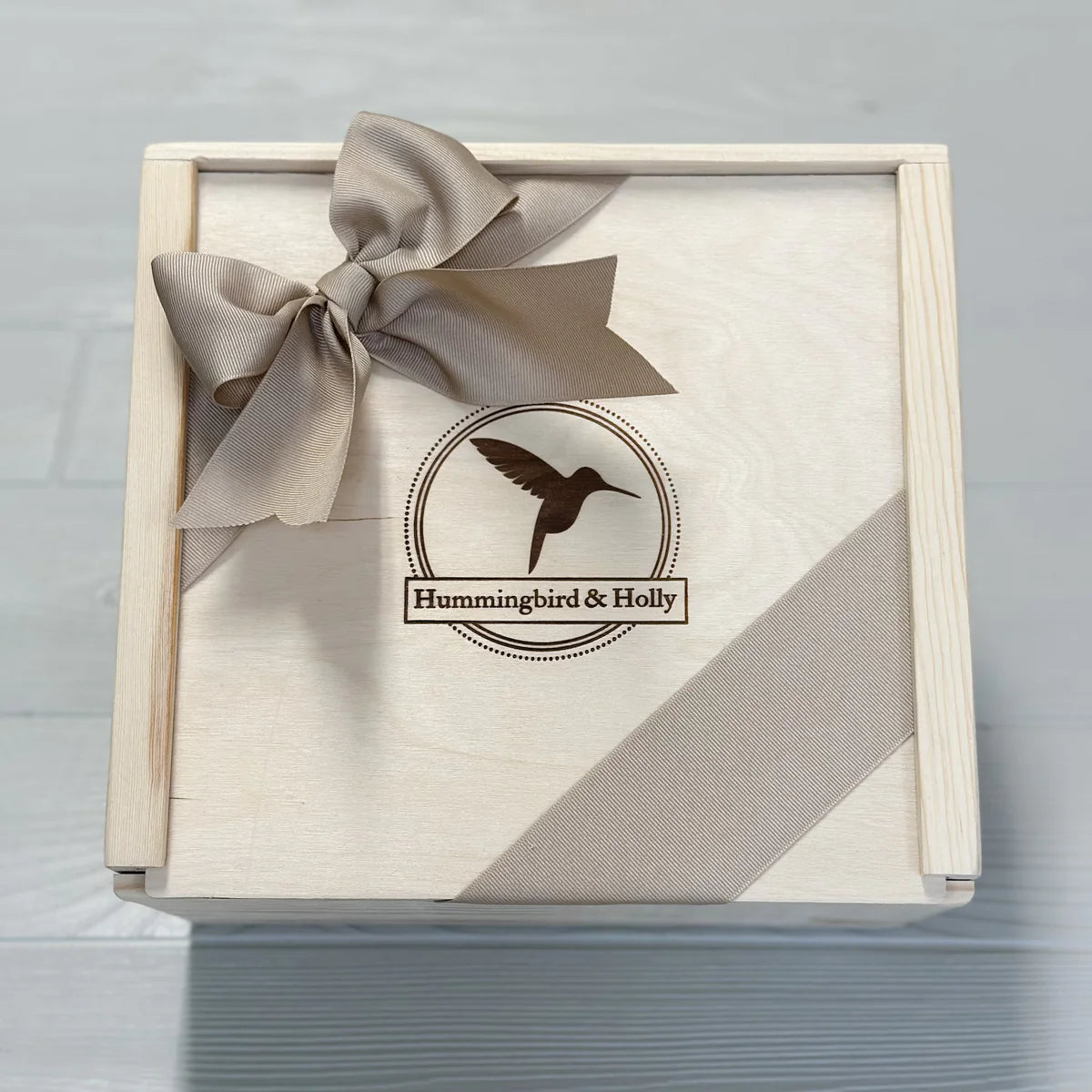 close up of the wooden slide lid box included in our Celebrate gift basket