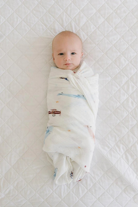 close up of swaddle blanket included in our born to soar gift basket.