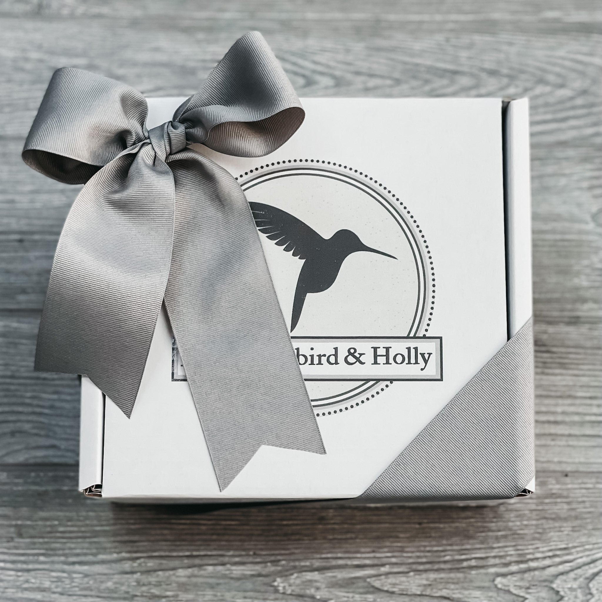 8x8 white gift box with logo and grosgrain ribbon