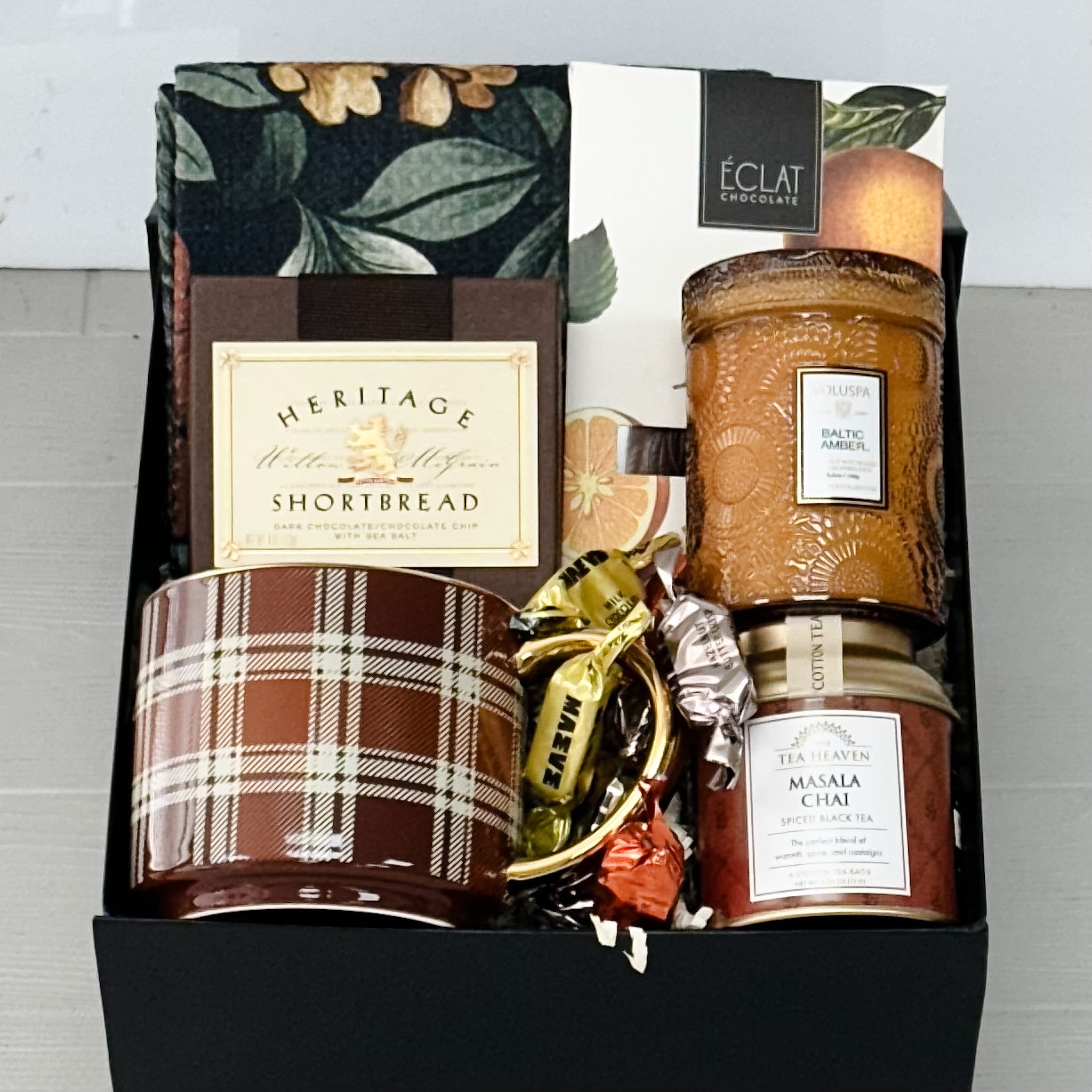 tea towel, mug, shortbread, tea, candle, chocolate all included in our grateful heart gift box.
