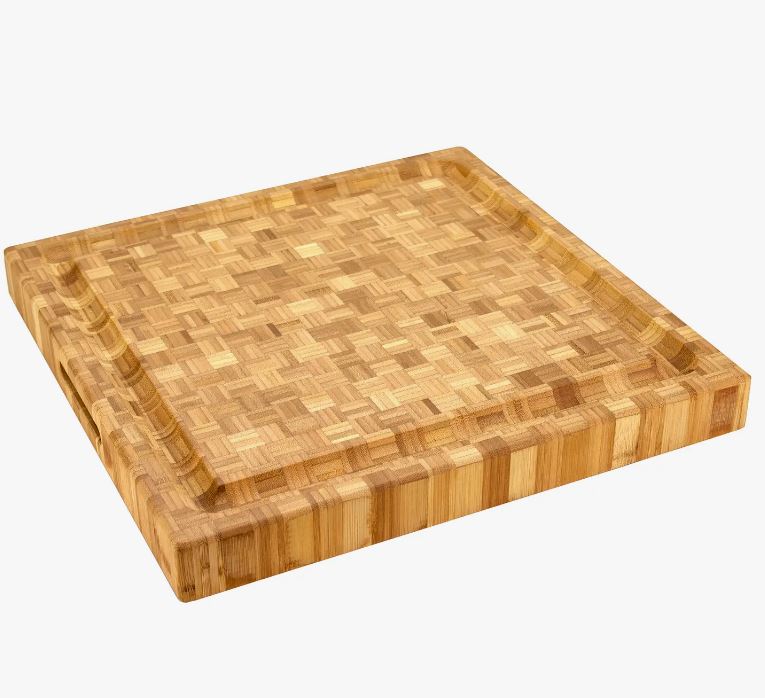 front of the Totally Bamboo cutting board included in the housewarming gift basket.