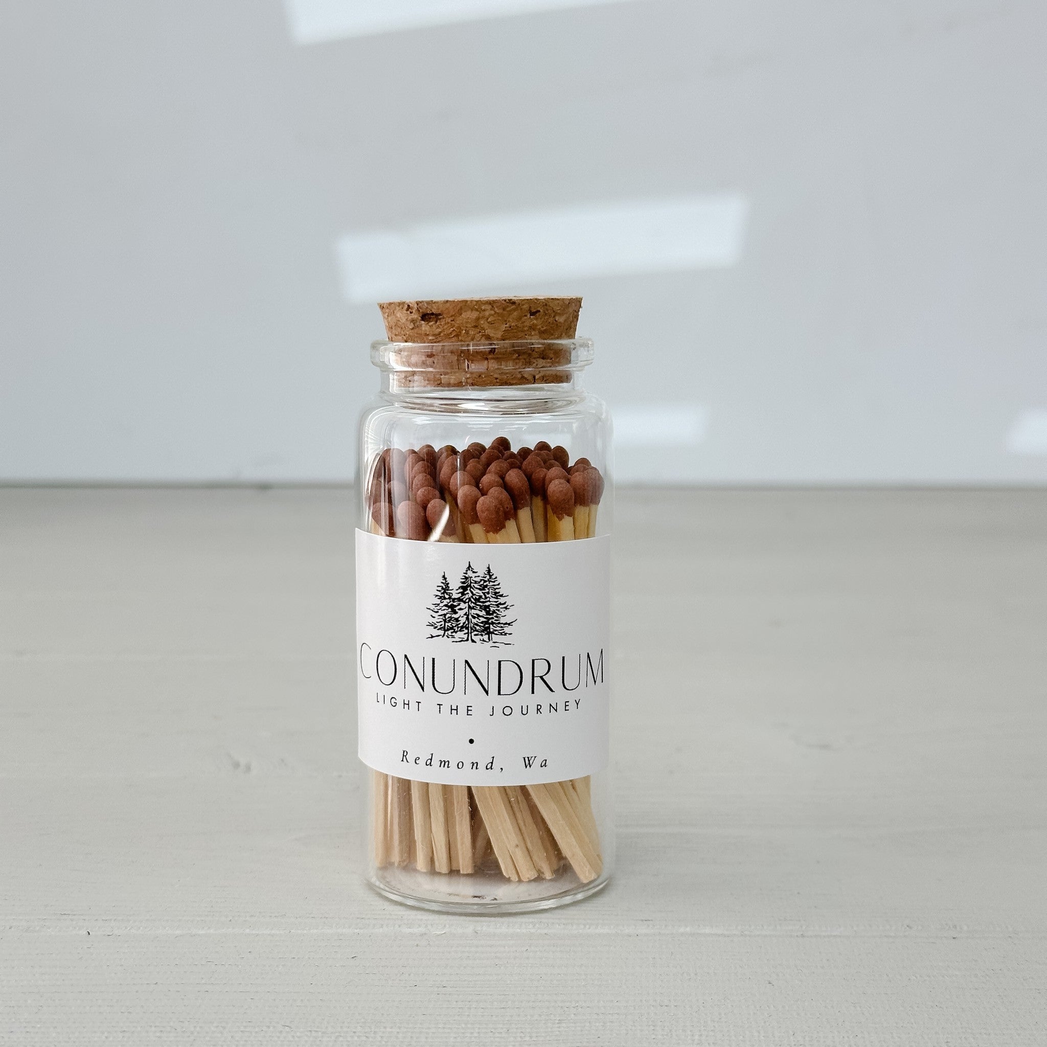 glass jar of brown matches by conundrum snacks