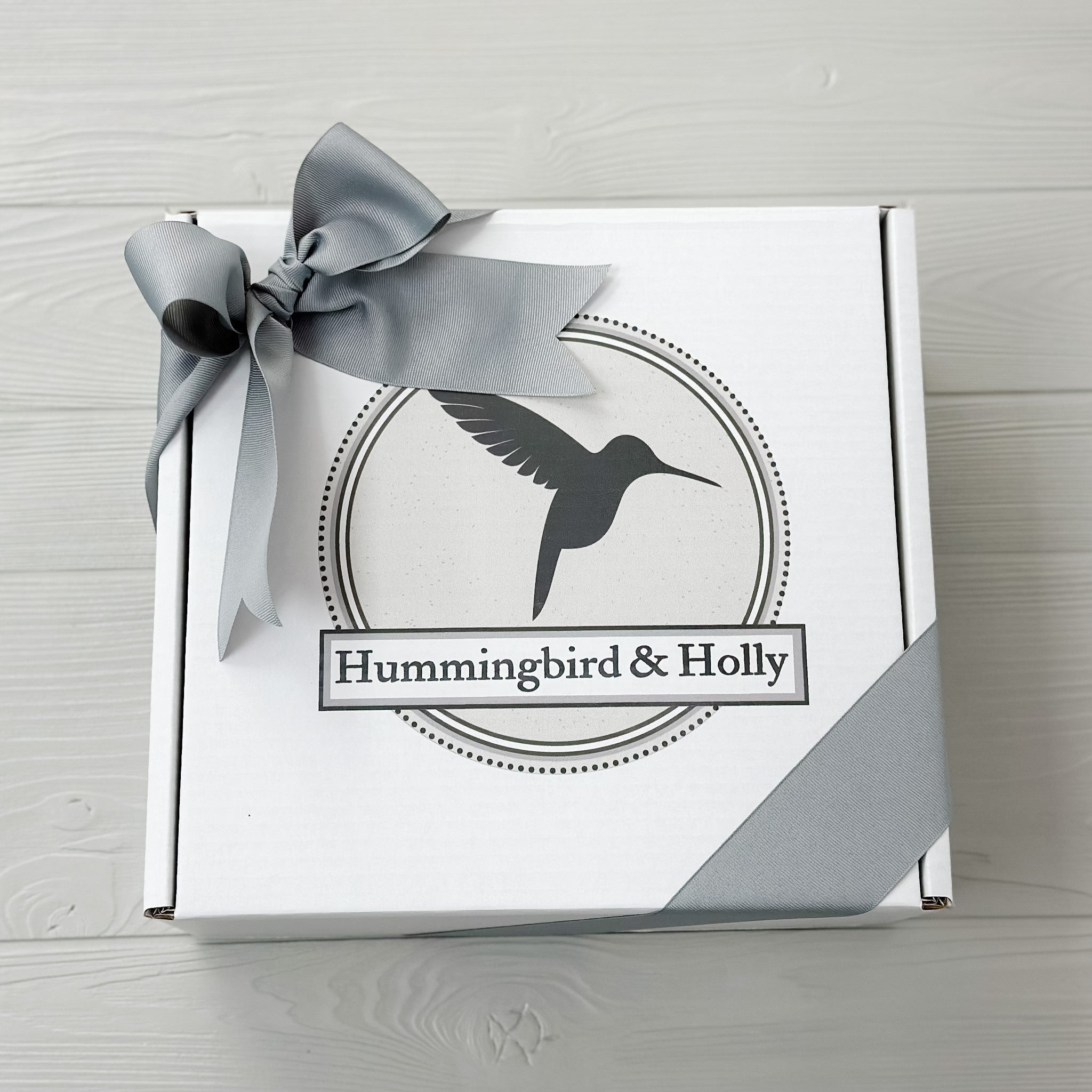 gift box with Hummingbird and Holly logo included in Puppy love gift basket