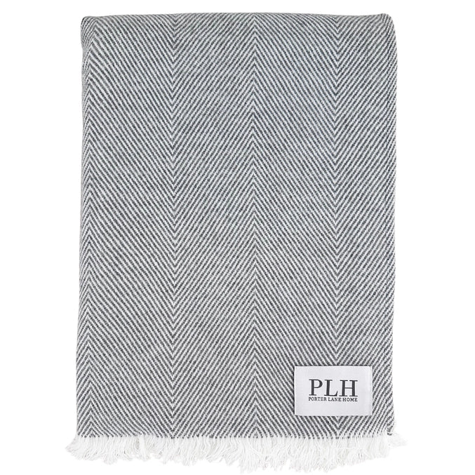 Close up of our gray herringbone blanket.