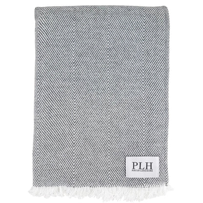 Close up of our gray herringbone blanket.