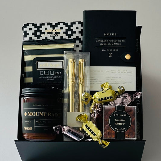 chocolate, notebook, pens, candle, candy all included in our northwest notes gift box.