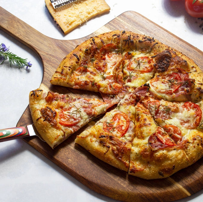 close up of wooden pizza peel