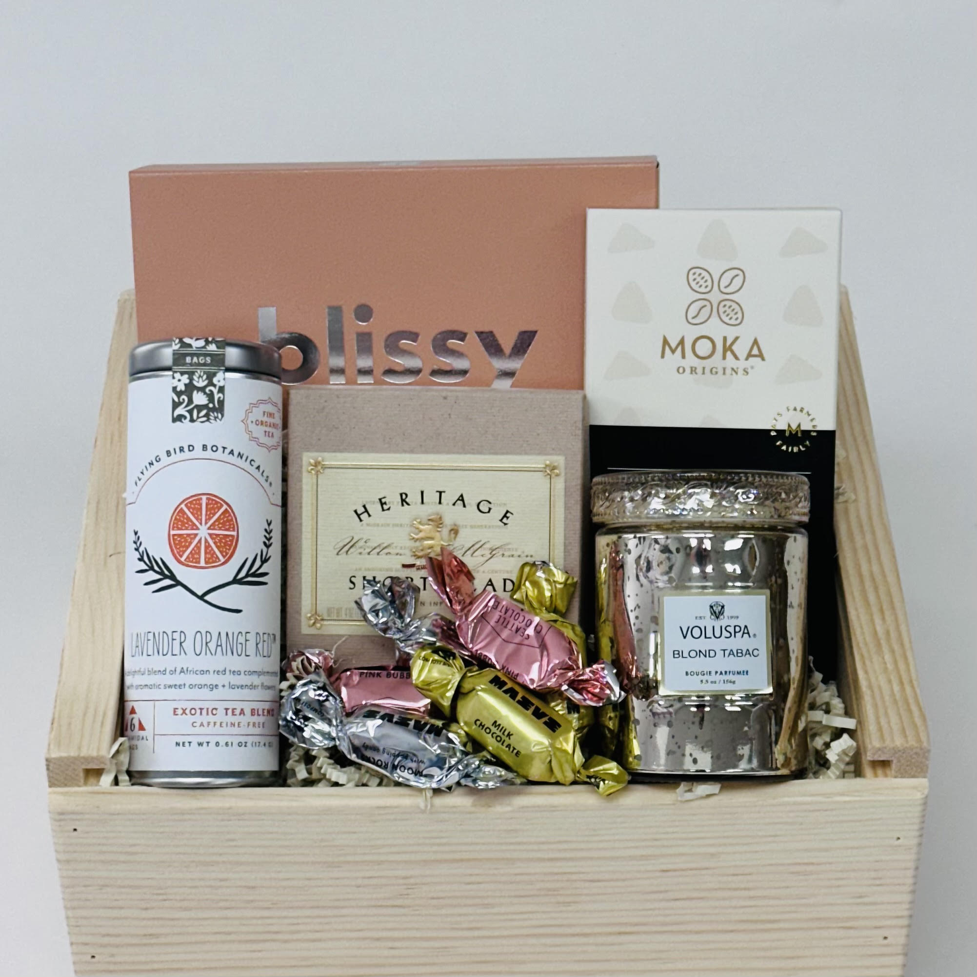 silk sleep mask, candle, tea,  shortbread, and chocolate, all included in our sweet dreams gift box.