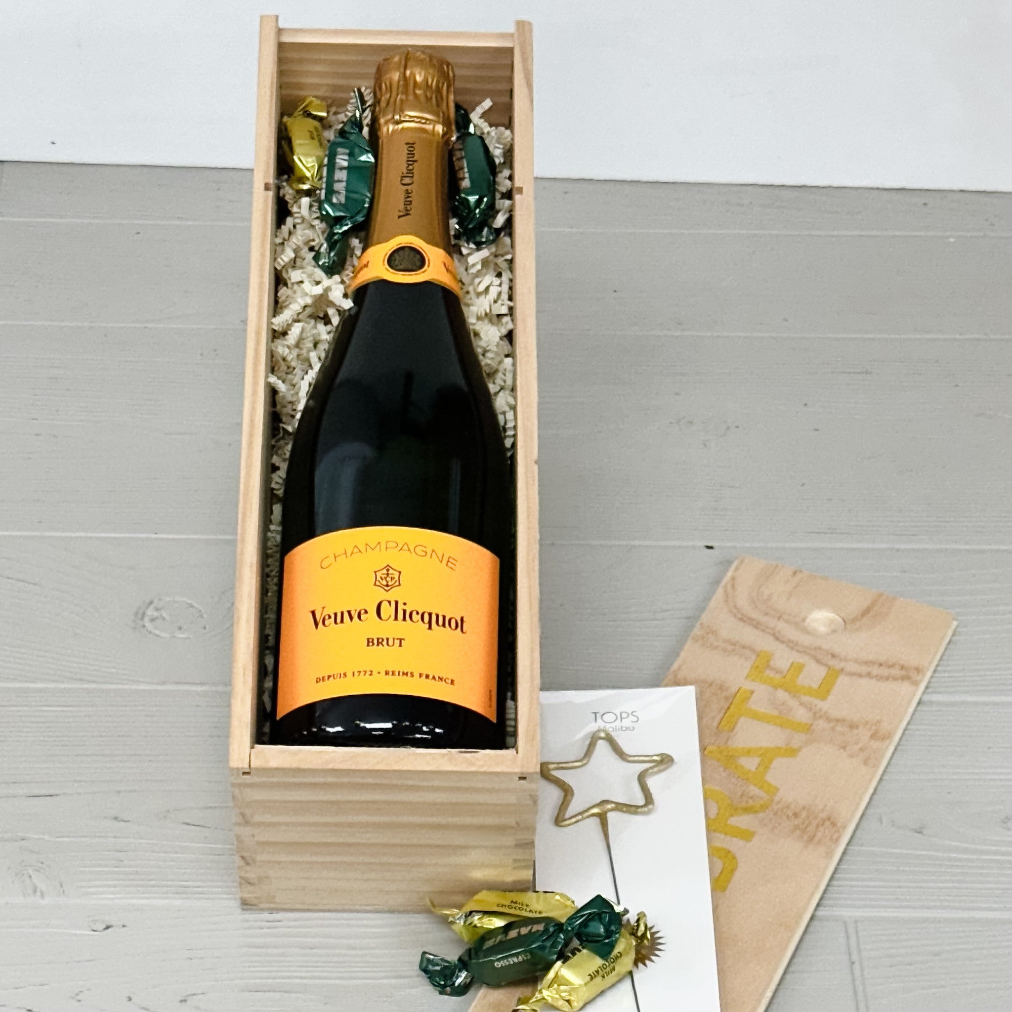 veuve with gold star sparkler and truffles 