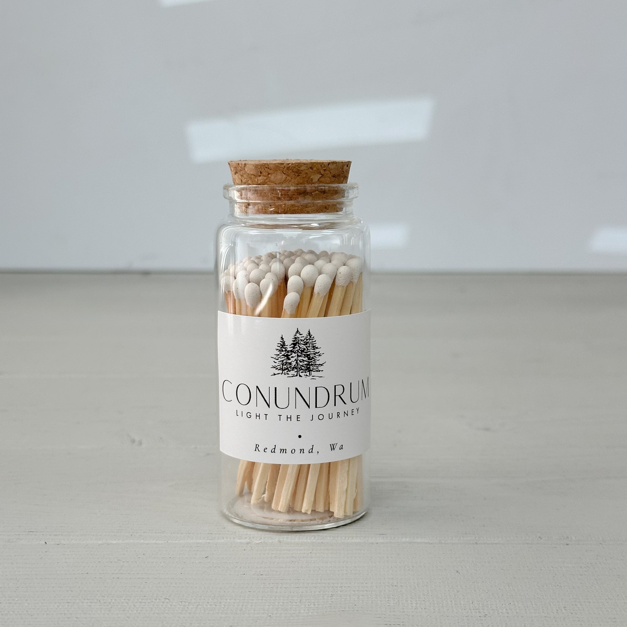 glass jar of white matches by Conundrum Snacks
